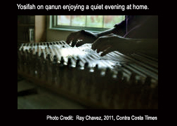 Yosifah Rose playing qanun on a quiet evening at home